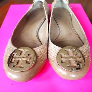 Tan Tory Burch flats with snake embossed leather